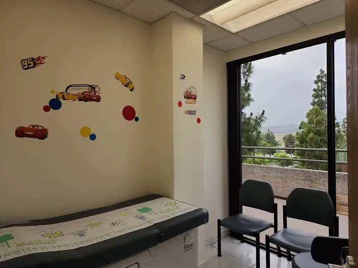 Race-car exam room with garden views — Lighthouse Pediatrics, Torrance