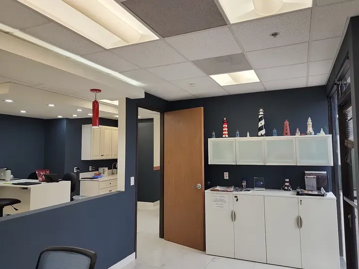 Our clinic front desk, home to our lighthouse collection — Lighthouse Pediatrics, Torrance